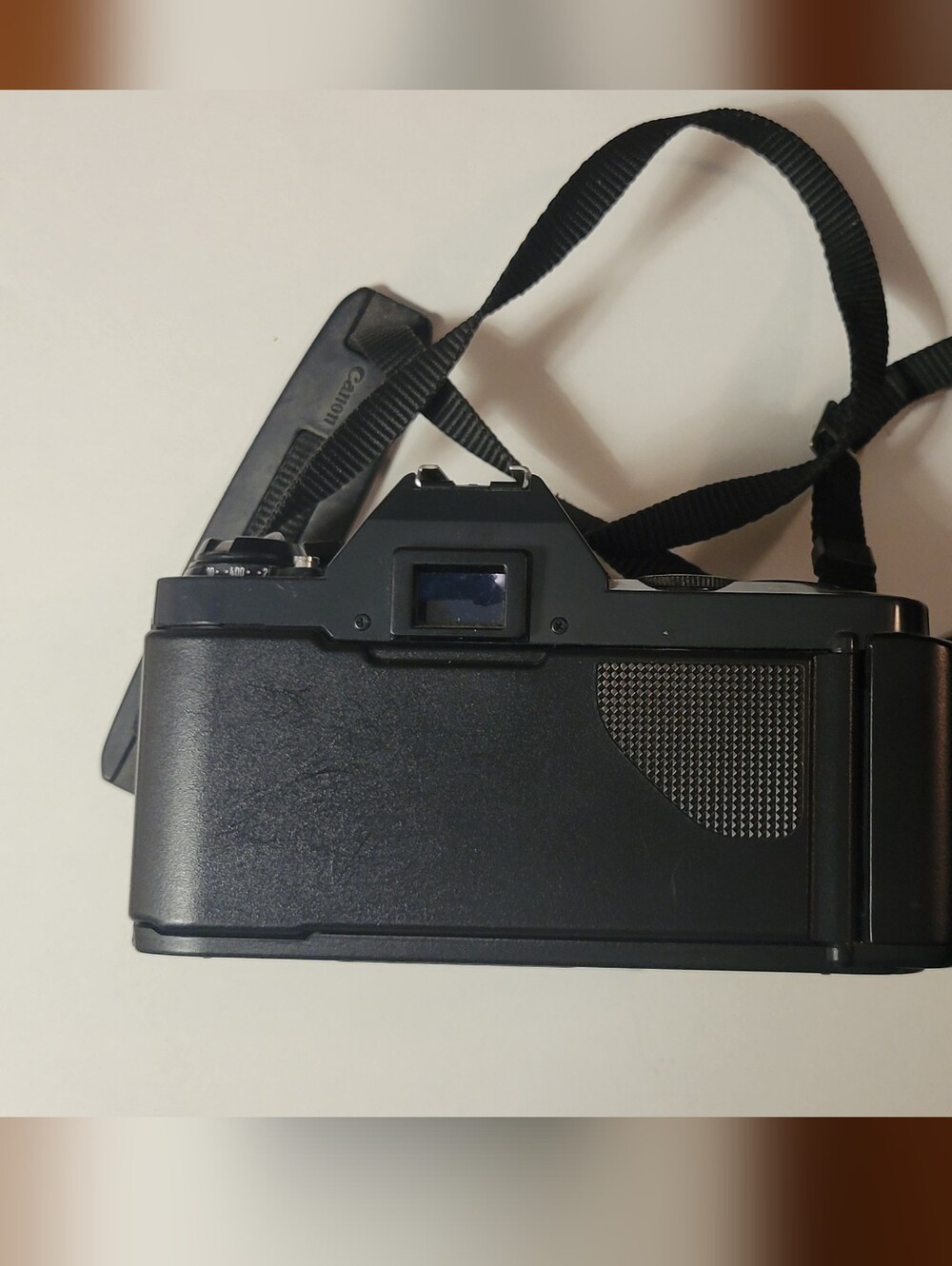 Canon black film camera with 50mm FD f/1.8 lens and neck strap - Picture 5 of 6